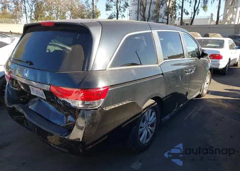 2014 Honda Odyssey Ex-L z USA, uszkodzony, nr VIN 5FNRL5H67EB065098